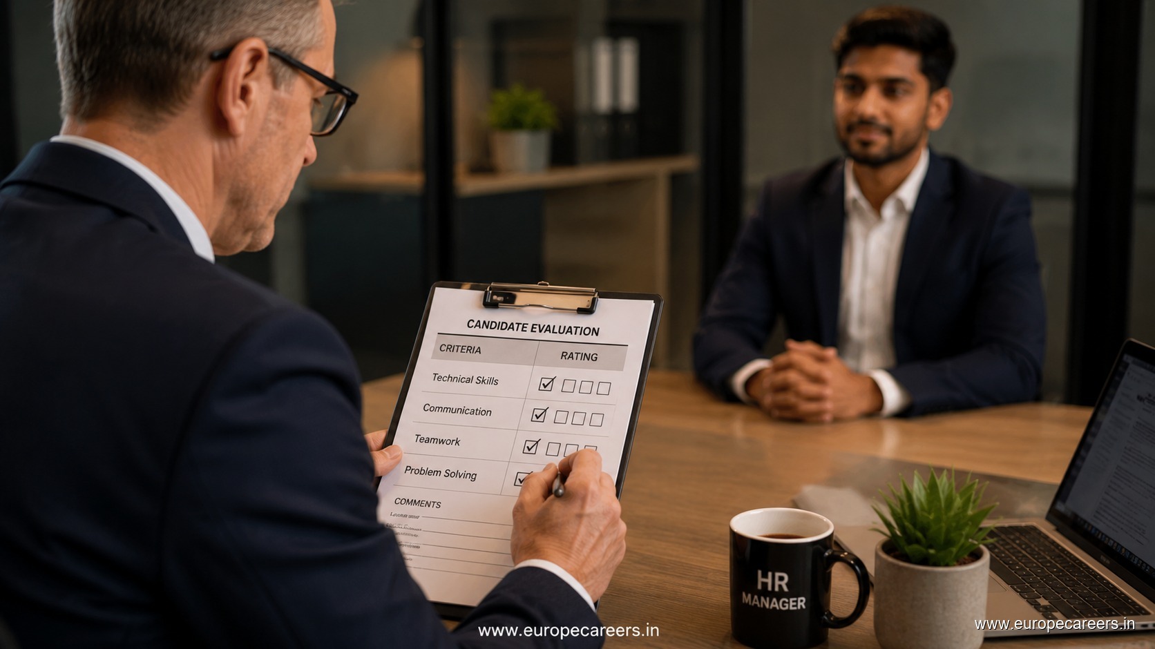 Indian professional meeting a German employer for a job interview